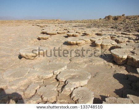 mineral formations caused by volcanic activity form sculpted statues in the Danakil desert of Ethiopia