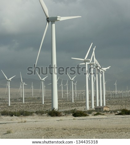Giant propeller silos produce electricity on a wind farm near Palm Springs in the California desert