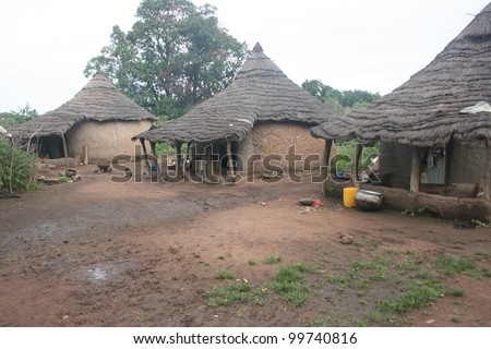 a remote village of the Gaan people of Burkina Faso, Africa, homes made from mud with thatched roofs.