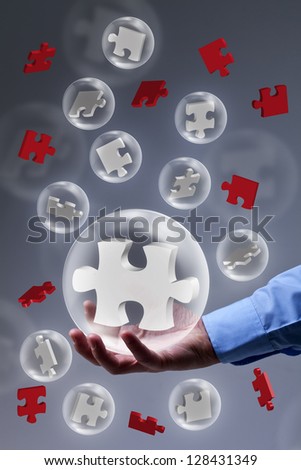 The key piece of a solution concept - puzzle pieces in glass bubbles