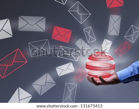 Businessman controlling digital information flow - holding tech bubble radiating mail envelopes