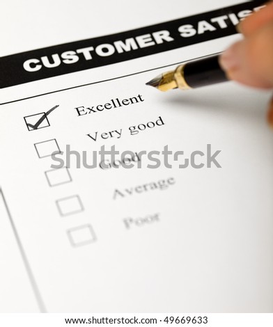 Business values - satisfied customers concept with a survey form