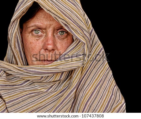 A Striking Image of a woman with cape