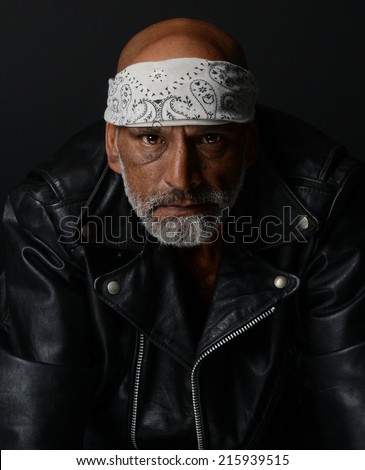 Strong Image of a very Tough Man on Black
