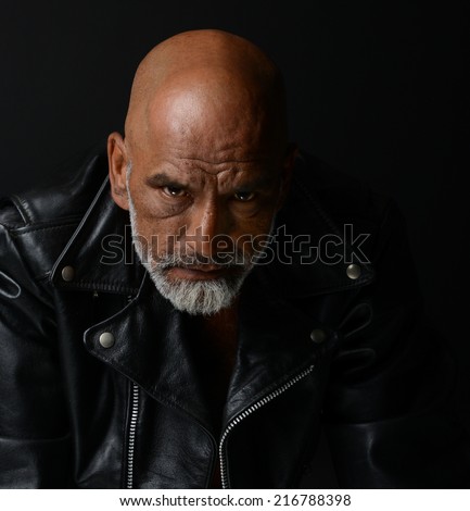 Strong Image of a very Tough Man on Black