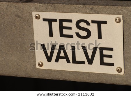 Test Valve sign In industrial area of Monterey