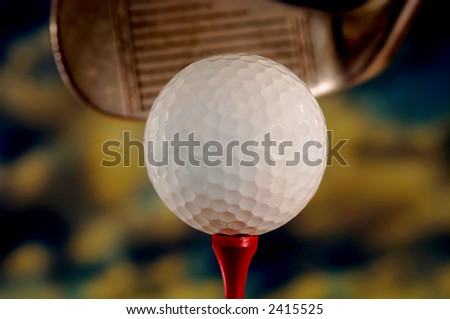 Macro closeup of Golf ball Against Sky with Club