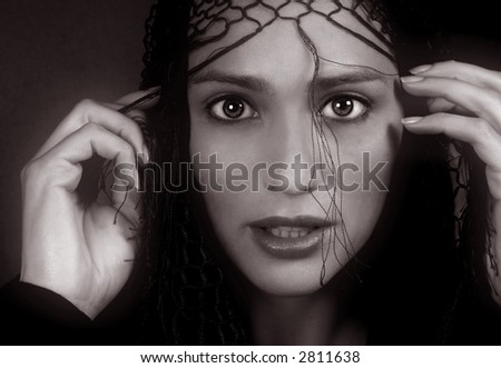 Beautiful Black and white image of Middle eastern woman with shawl