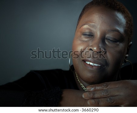 Beautiful Portrait of Afro american woman at peace with herself
