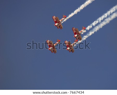 Image of 4 Red barons stunt team at an air show