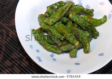Image of a bowl of spicy japanese fried green peppers