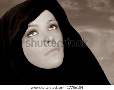 Beautiful portrait of a religious Woman with cape