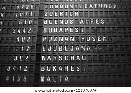 Airport sign of flights and departure times