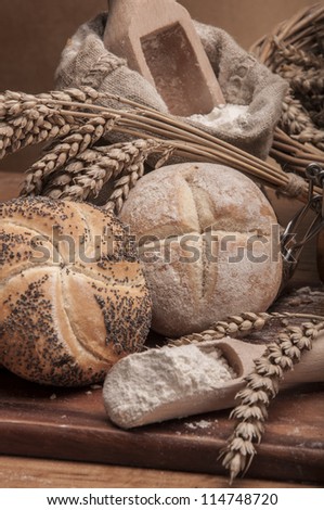 Baked goods on wooden table and brown background