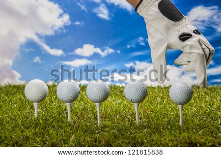 Golf game equipment on grass