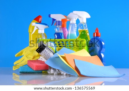 Cleaning concept with bottles and brushes