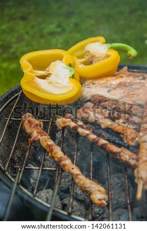 Fire and grilling theme with grilled food