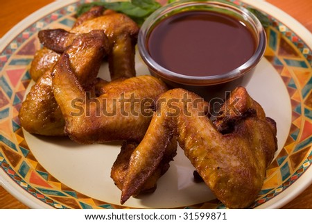Fried chicken wings, closeup studio shot