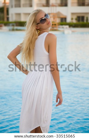 Summer closeup shot of a beautiful caucasian girl, outdoor shot