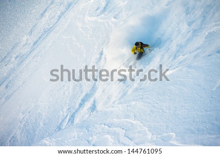 Virgin snow skier. Off-piste.