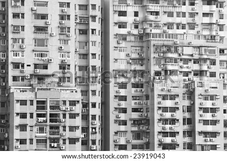 Buildings in Macau (China's Special Administrative Region) with different types of windows or extensions built by the residents.