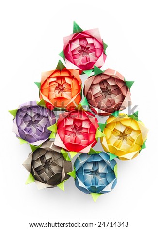 8 origami roses on a white background arranged in a shape of a pear or a tear drop