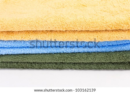 some new dry towels on white background in studio