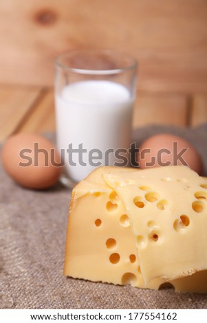 piece of fresh cheese with eggs, milk