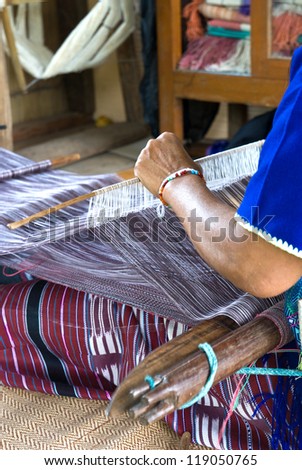 Housewife weave cotton cloth in Thailand