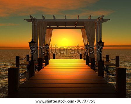 wedding gazebo on the wooden pier into the sea with the sun at sunset