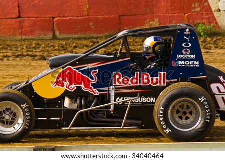 TERRE HAUTE, IN - JULY 15: Driver Cole Whitt of 67k Red Bull Machine takes a lap at Terre Haute Action Track during Indiana Sprint Car Week on July 15, 2009 in Terre Haute, Indiana.