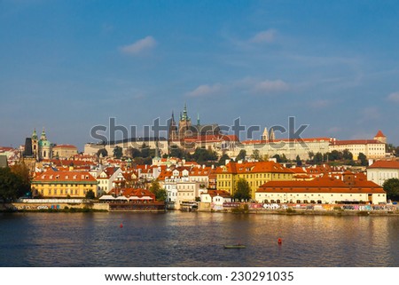 Prague, Czech Republic - October 6, 2014: View of Prague and the Vltava River Promenade. Excursions on the Vltava River on tourist ships.