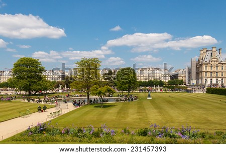 Paris, France - May 3, 2014: Tuileries Garden favorite place for walking and recreation tourists and residents. Located between the Louvre and the Place de la Concorde.
