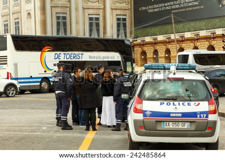 Paris, France - December 20, 2014: Police check on the Place de la Concorde wedding procession.