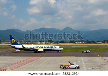 Bergamo, Italy - May 27, 2015: Ryanair\'s aircraft takes off at the airport of Bergamo. The company Ryanair offers some of the not expensive flight to Europe.