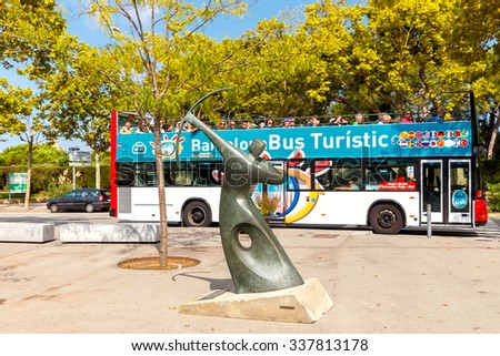 BARCELONA, SPAIN - September 5, 2015: Tourist bus on Montjuic hill. Barcelona City Tour new official tourist bus, which shows the city with an audio guide.