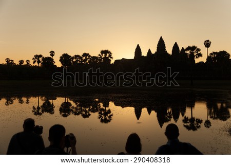 people starring at sunrise  at the famous temple of Angkor Wat near Siem Reap in Cambodia