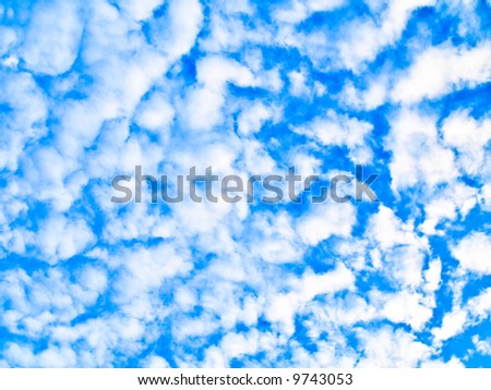 Fluffy clouds on blue sky also called altocumulus