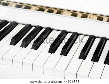 Closeup of a keyboard white  piano