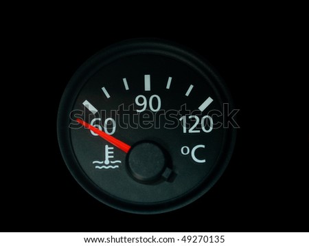 Temperature  gauge with a red needle  on car a dashboard isolated on black
