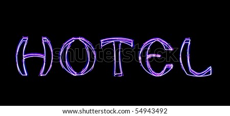 Purple hotel neon sign on black