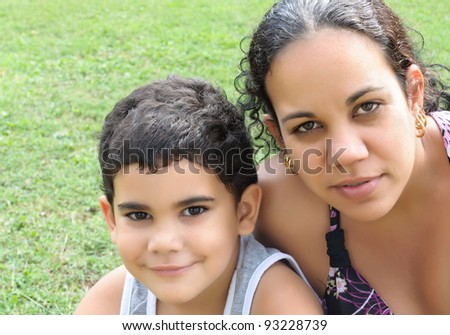 Young latin mother and her adorable son