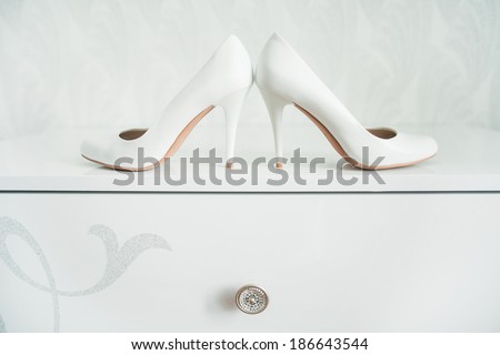 Fashionable women\'s high-heeled shoes isolated on white background