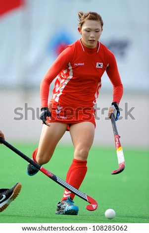 PATHUM THANI,THAILAND-JULY 3:Song Bo Ram (no.17 Red) of Korea in action during the WomenÃ¢Â?Â?s Junior AsiaCup Korea and Kazakhstan at QueenSirikit Stadium on July3,2012 in PathumThani,Thailand.