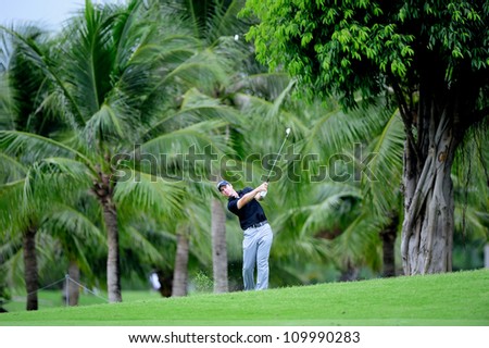 NAKHONPATHOM,THAILA ND - AUG 10:Scott Strange of AUS gestures to hits a shot during hole9 day two of the Golf Thailand Open at Suwan Golf&Country Club on August 10, 2012 in Nakhonpathom Thailand