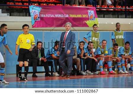BANGKOK,THAILAND AUGUST24:Head coach Jose Venancio Lopez Hierro (Gray suit)of Spain in action during Friendly match between Thailand and Spain at Nimibutr Stadium on August24,2012 in Bangkok Thailand