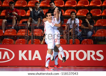 BANGKOK,THAILAND-NOVEMBER03:Vidan Bojovic of Serbia celebrates with team mate after scoring during theFIFA Futsal World Cup between Egypt and Serbia at Indoor Stadium Huamark on Nov3,2012 in,Thailand.