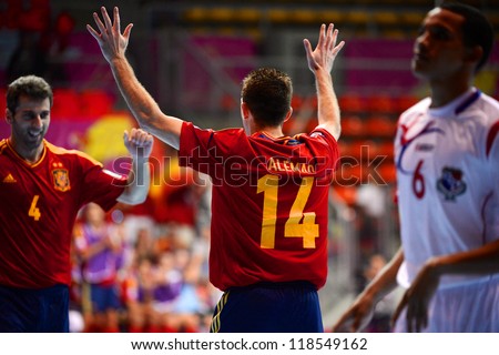 BANGKOK,THAILAND-NOVEMBER05: Alemao (no.14) of Spain celebrates with team mate during the FIFA Futsal World Cup Spain and Panama at Indoor Stadium Huamark on Nov5, 2012 in Bangkok,Thailand.