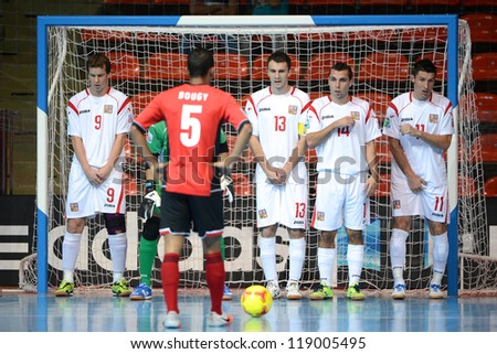 BANGKOK,THAILAND-NOV 06:Islam Gamila (no.13) of Czech Republic in action with team mate during the FIFA Futsal World Cup Egypt and Czech Republic at Indoor Stadium Huamark on Nov6, 2012 in,Thailand.