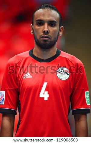 BANGKOK,THAILAND-NOVEMBER 06:Mohamed Shalaby of Egypt looks on during the national anthem the FIFA Futsal World Cup between Egypt and Czech Republic at Indoor Stadium Huamark on Nov6,2012 in,Thailand.